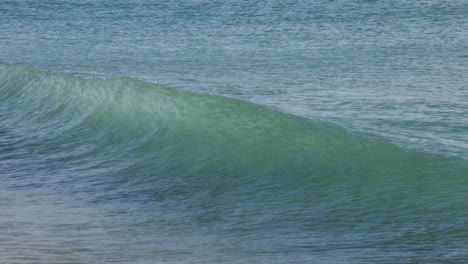 aqua green blue waves twisting at the crest, bay of bengal sea