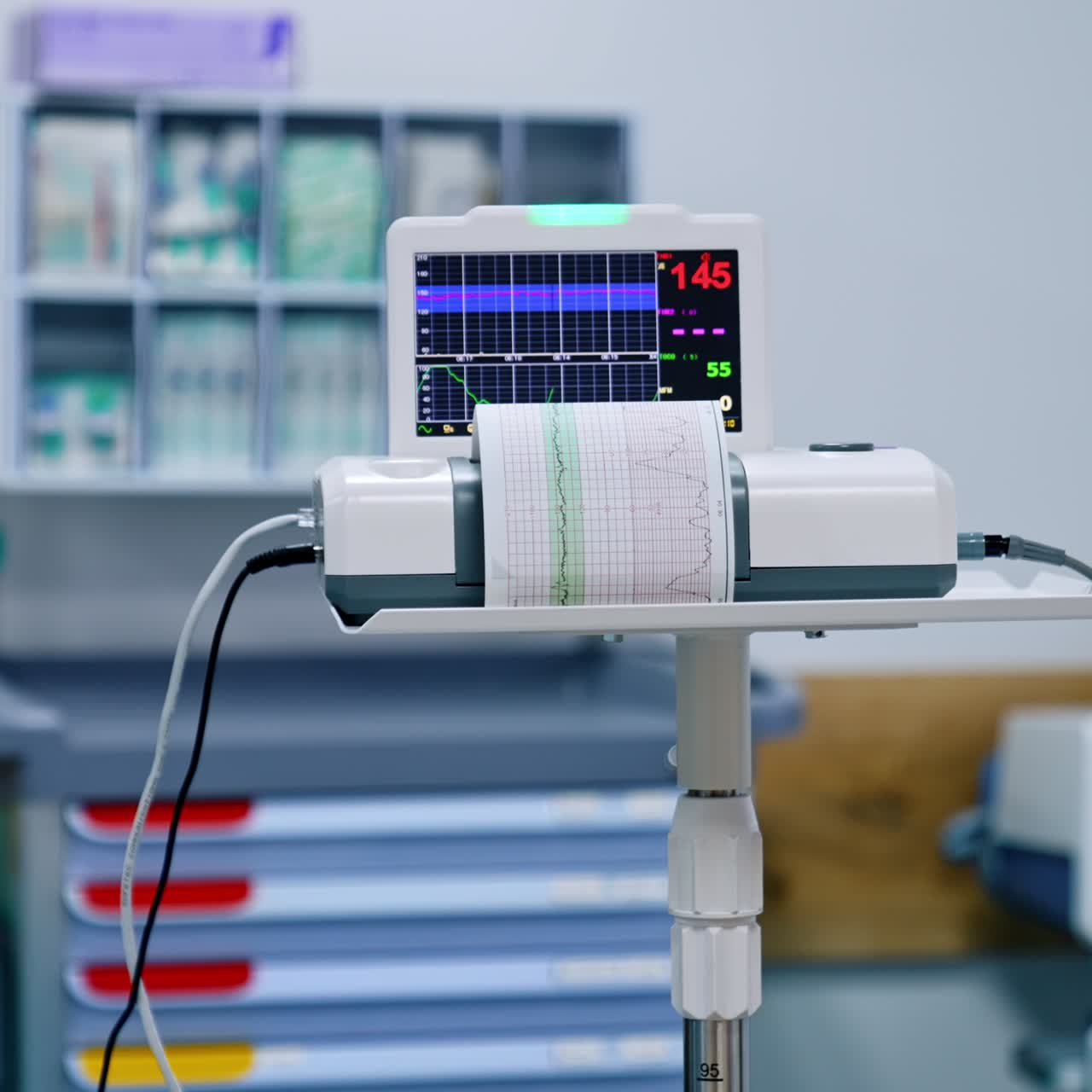 Little apparatus for checking heart. Advanced equipment working in the hospital ward