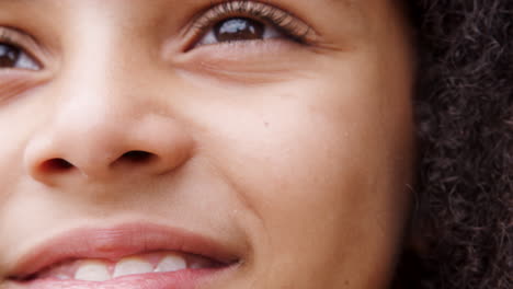 Close-Up-Of-Cheeky-Young-Boy-Looking-Into-Camera-And-Smiling