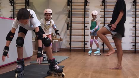 children learning to roller skate