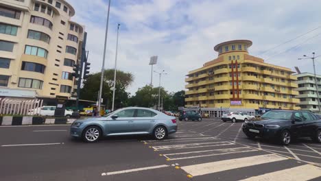 busy street scene in india with traffic and public transportation