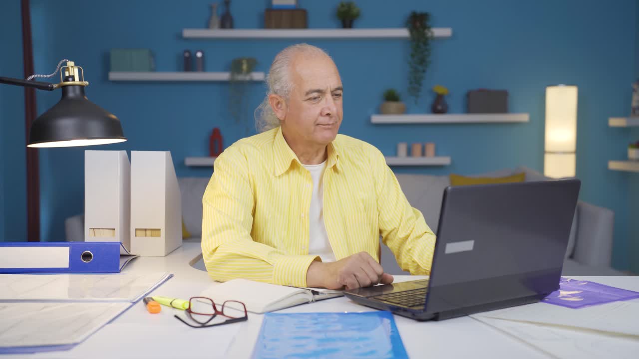 Home office worker old man confident.