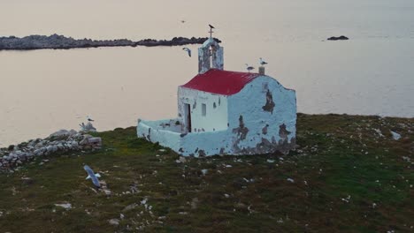 abandoned island church with seagulls in slow motion