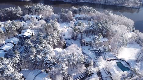 Drone-flyover-of-snowfall-on-Raleigh-NC-roads-and-houses