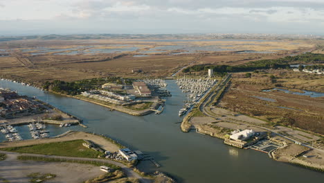 chichoulet harbor along the river aude aerial drone view sunset time fishing