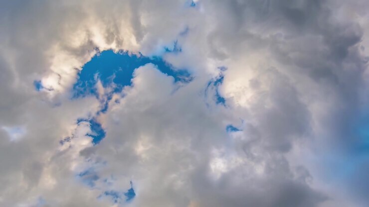 Time Lapse of Clouds Moving Across Blue Sky