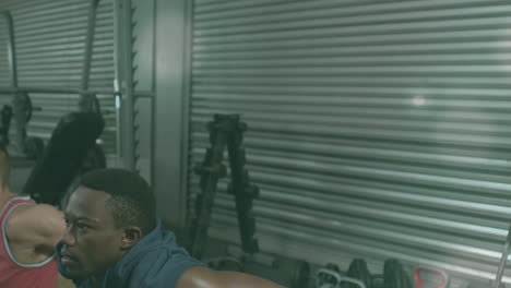 animation of lens flares over multiracial men doing triceps dips on boxes at gym