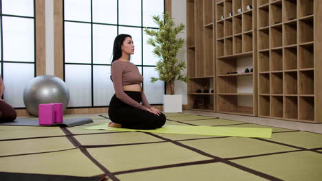 women in yoga studio