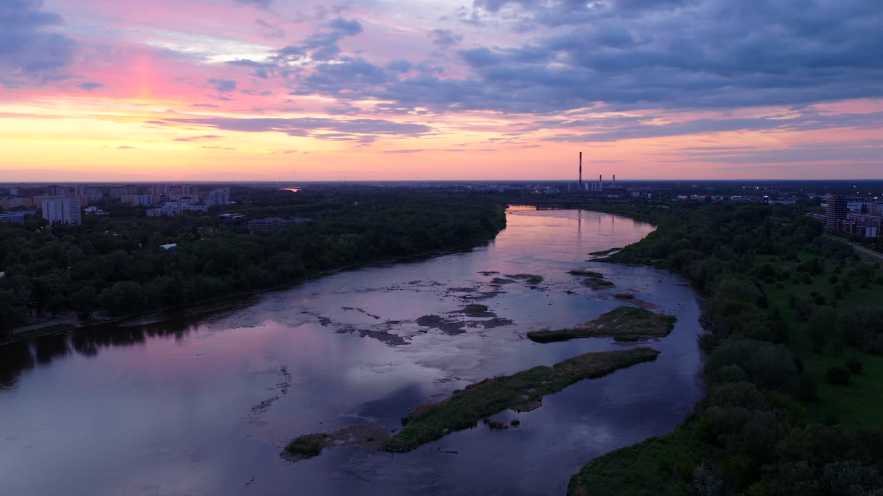 Vistula river Warsaw during beautiful moody sunset skies, aerial view