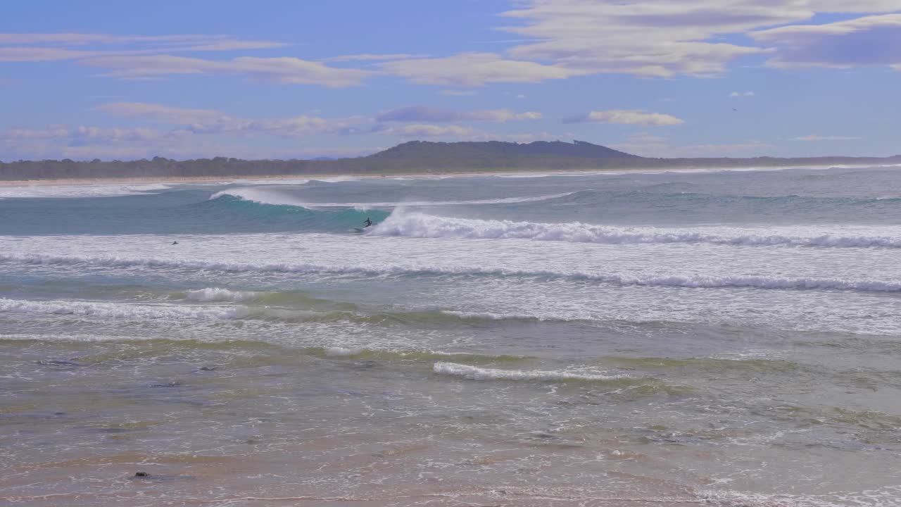 Ocean Waves On A Sandy Beach - Surfing At Crescent Head During Summer - Sydney, New South Wales, Australia. - panning shot