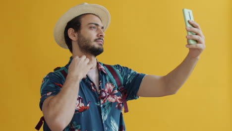 man taking selfie in vacation