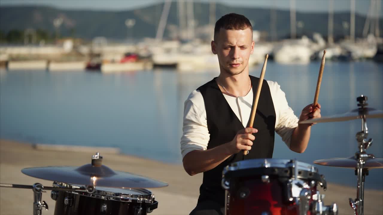 Drummer Playing Drums at the Waterfront