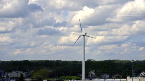 windmill next to overhead power lines