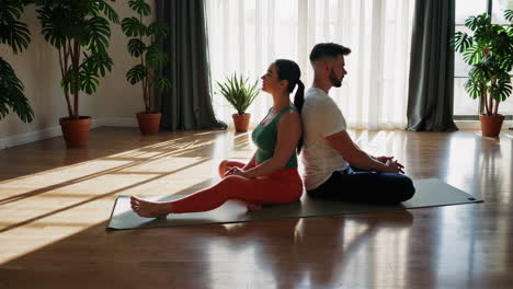 couple practicing yoga together