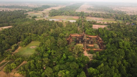 angkor temple aerial, banteay samre, nested in the mystic cambodian jungle, drone rotation footage