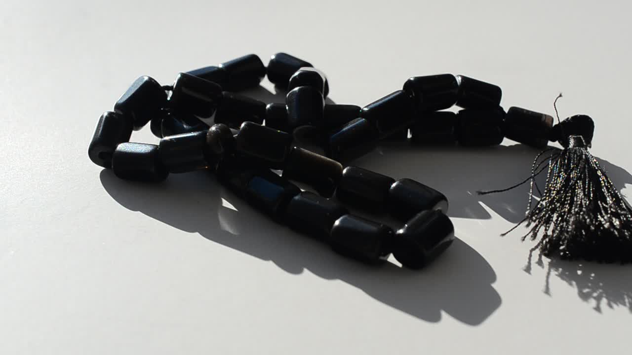 Beads on a white background. For a prayer