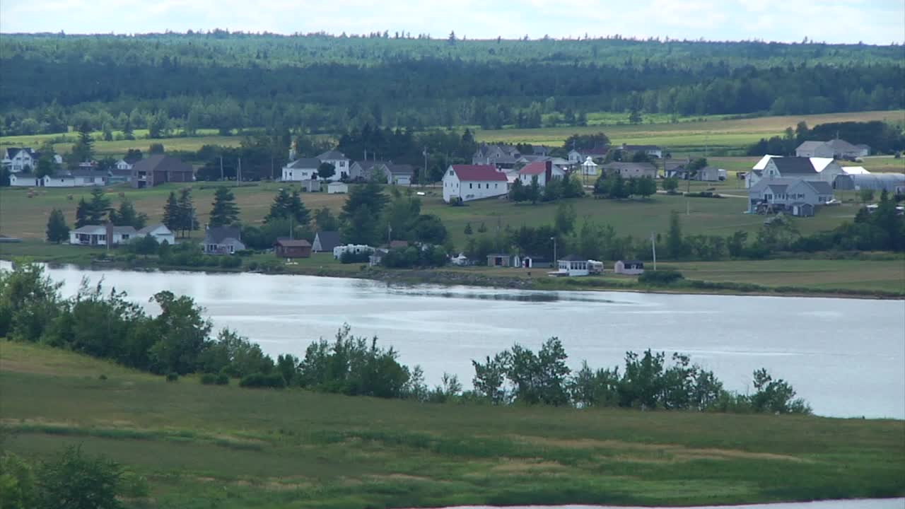 A shot of the village community of Sainte-Marie-de-Kent and the Bouctouche River in New Brunswick, Canada