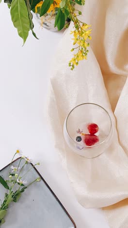 ice cubes with crystals and flowers