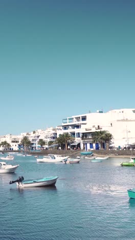 beautiful harbor view with boats and white buildings