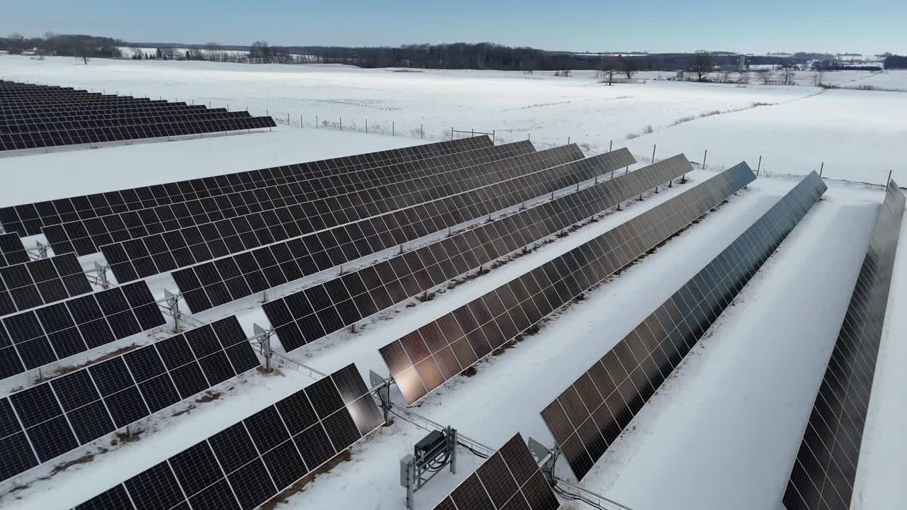 During the winter, a Wisconsin field of solar panels absorbs the sun's energy and converts it to electricity.