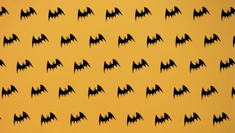 Animation-of-falling-bats-on-orange-background