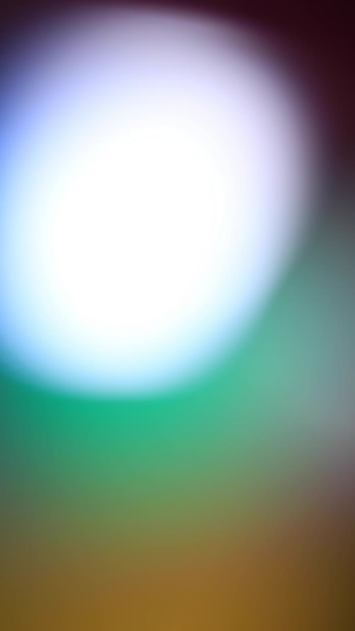 Abstract Light Leaks and Colorful Lens Flares on Dark Background