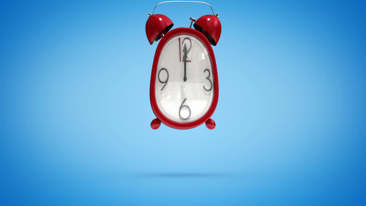 귀여운 알람 시계가 자정까지 세고 있습니다.