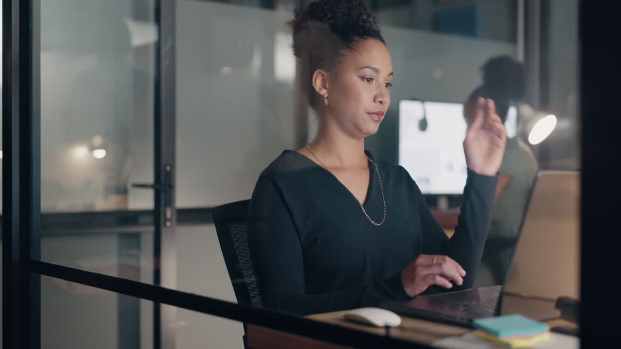 Woman Working Late at Night in Office