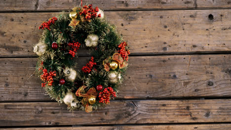 christmas wreath on wooden table 4k