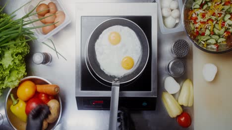 cooking fried eggs