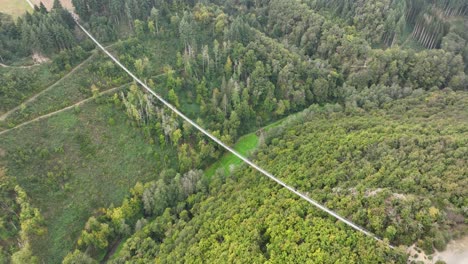 aerial drone video of the geierlay suspension bridge, pedestrians bridge, spans the morsdorfer bachtal. adventure destination.
