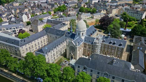 aerial view of the historic chapelle saint-julien and lycée ambroise-paré, revealing surrounding rooftops of laval, mayenne, france