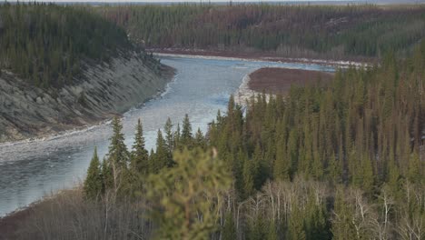ice chunks flow down river during spring breakup.