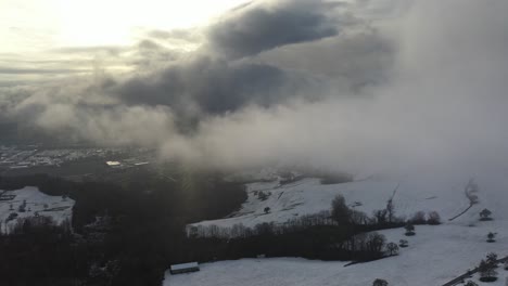 snowy and sunny mix with clouds in a winter landscape