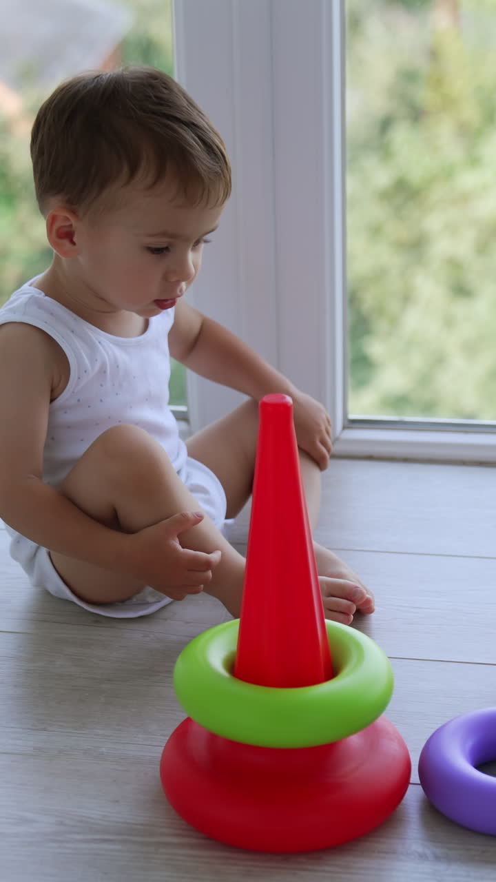 Baby Playing with Stacking Rings