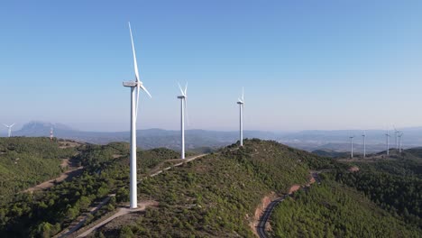 Drone-shot-of-a-wind-farm-for-eolic-energy-production-in-Catalonia,-Spain