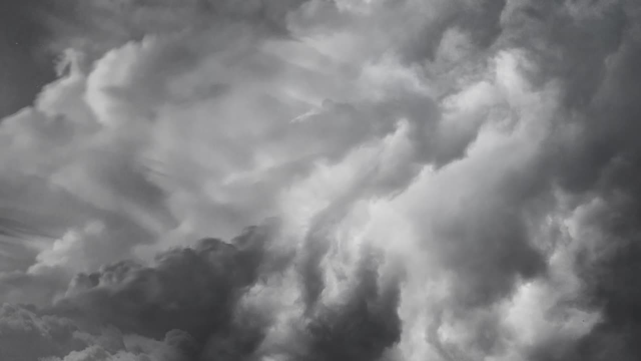 storm clouds and lightning bolts in white clouds