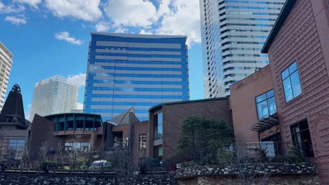 modern cityscape in harumi, tokyo with contemporary buildings under a bright sky