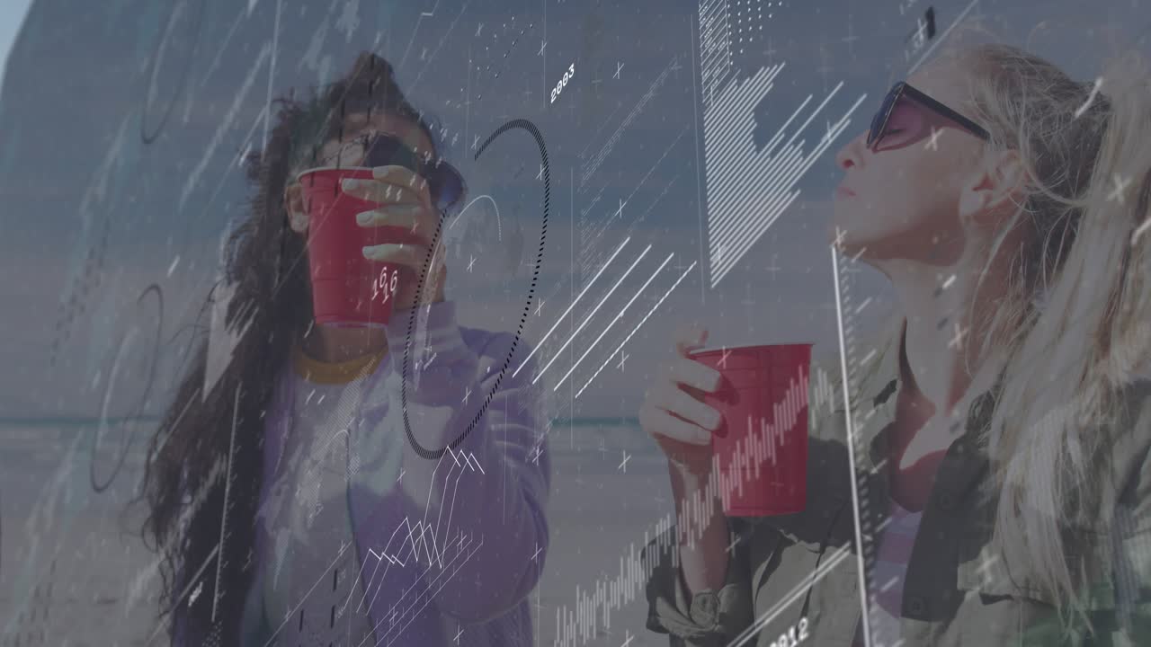 Women lifting red cups to lips monitoring hydration as data graphs drifting across sunny beach