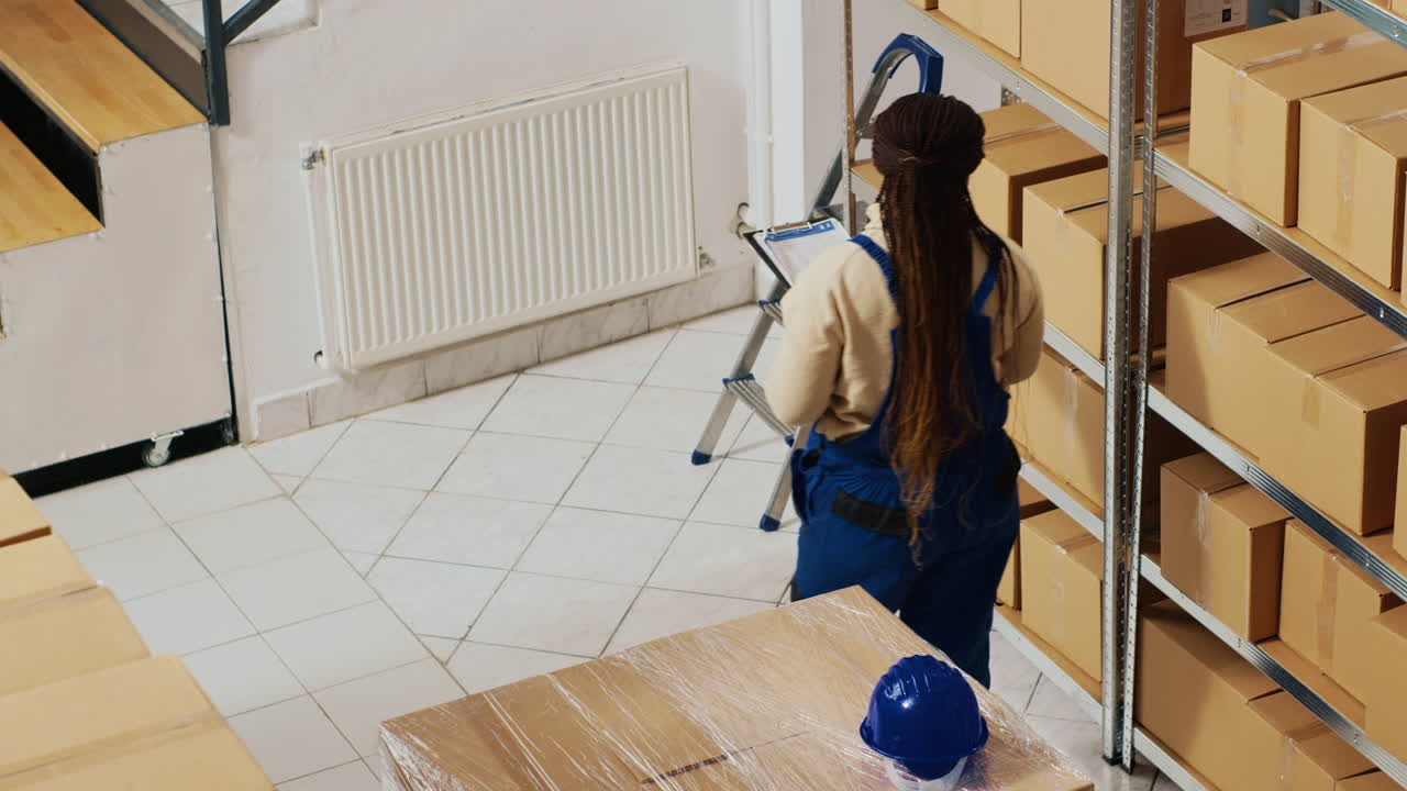 Warehouse workers checking inventory and managing stock