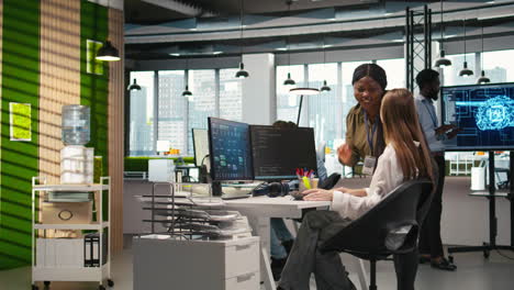 manager supervising young trainee in office using ai technology