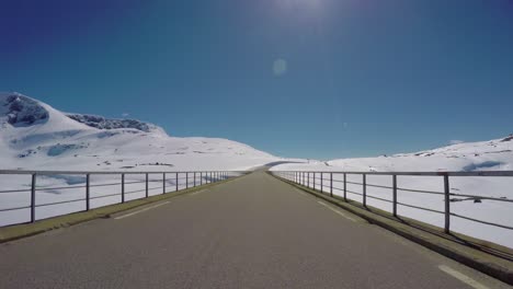 driving a car on a road in norway