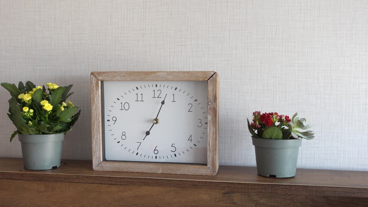 Wooden Clock with Flowers on Shelf