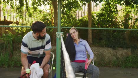 video of happy caucasian couple on having break the court