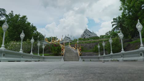 4K-Cinematic-landscape-travel-footage-of-the-Buddhist-temple-Wat-Kaew-Korawaram-in-the-town-of-Krabi,-South-Thailand-on-a-sunny-day