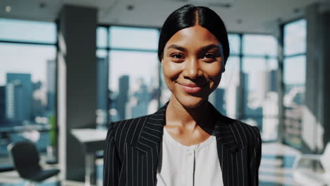 smiling businesswoman in modern office