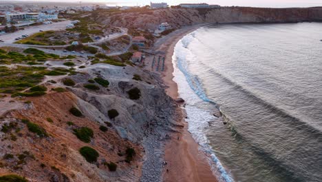 coastal view of portugal's shoreline with golden sands and gentle waves