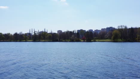 reveal-of-urban-lake-with-buildings