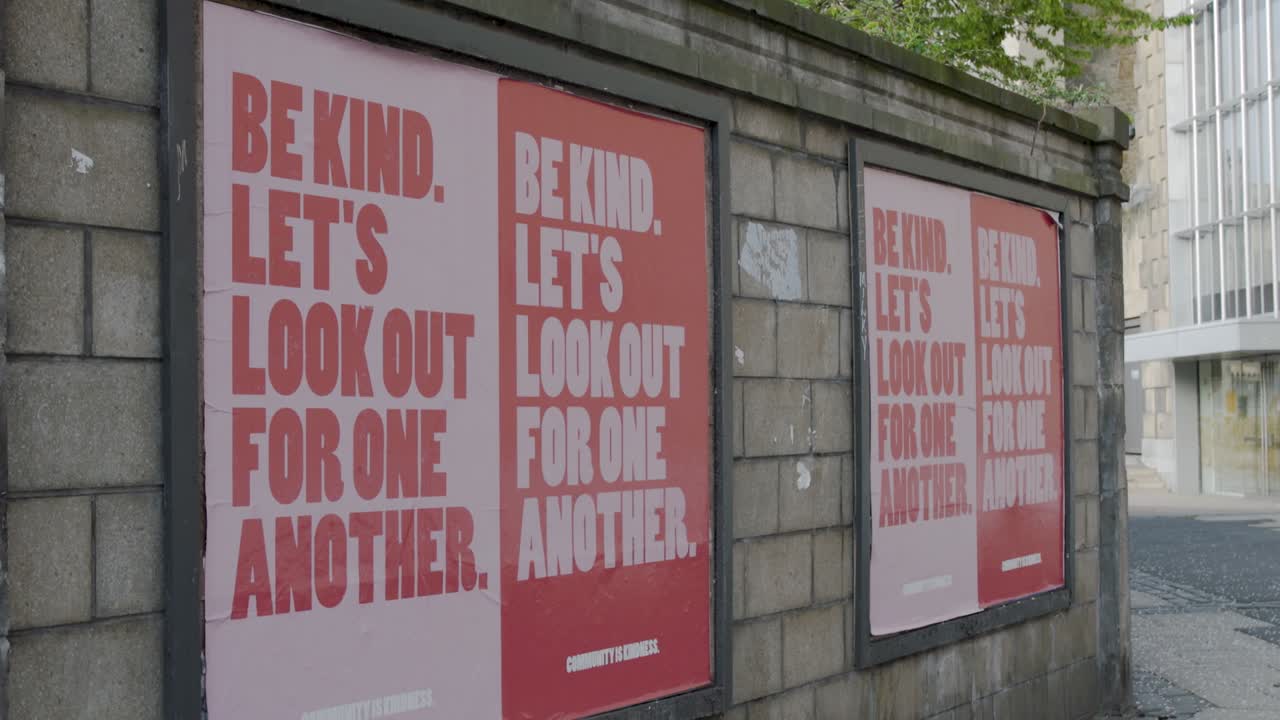 Close up on motivational poster, Edinburgh city centre walls, coronavirus