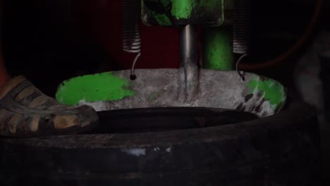 Process-removing-tire-from-the-rim-use-tire-changer